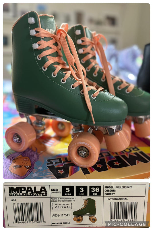 A pair of green roller skates with orange laces and wheels, displayed on a table with packaging visible in the background.