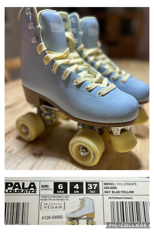 A pair of light blue roller skates with yellow laces and wheels, displayed on a wooden floor, with packaging that indicates the brand and size.