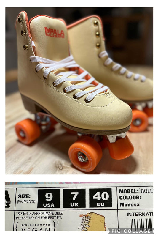 A pair of size 9 US women's yellow roller skates with orange wheels, displayed on a wooden floor.